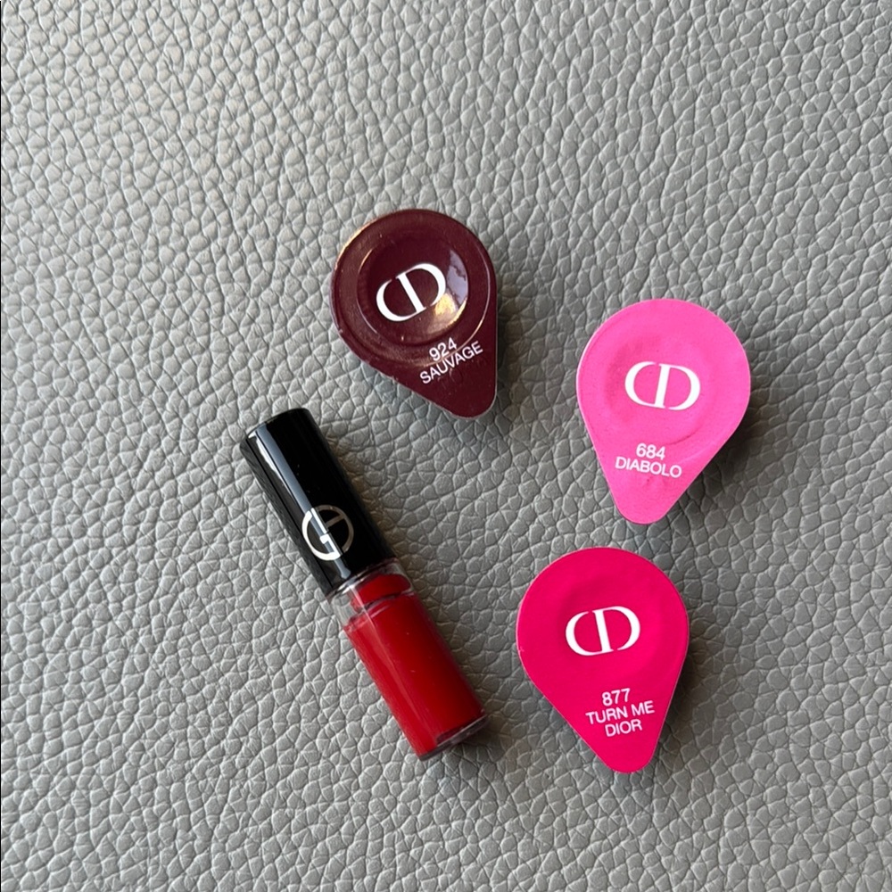 Armani Liquid Lipstick in 400 and Dior liquid lipsticks in 924, 684, 877. New